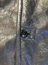 Load image into Gallery viewer, Kingspier Vintage - 2dm black sheepskin coat with shearling trim and lining, button closures and slash pockets.
