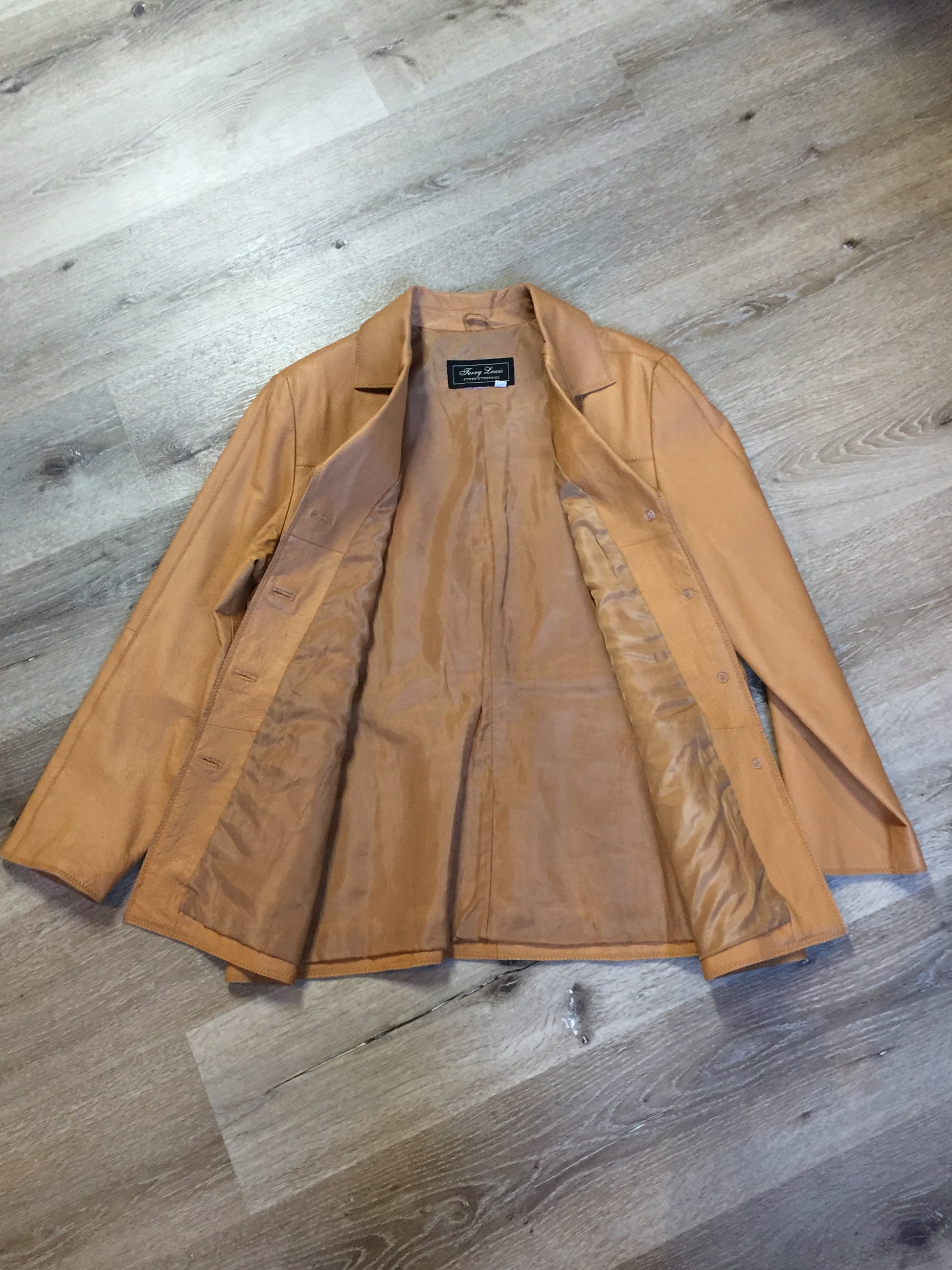 Kingspier Vintage - Jerry Lewis tan leather jacket with button closures and patch pockets. Size medium.