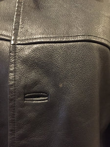 Kingspier Vintage - Gap black leather jacket with button closures, slash pockets, inside pocket and quilted lining. Size large. 