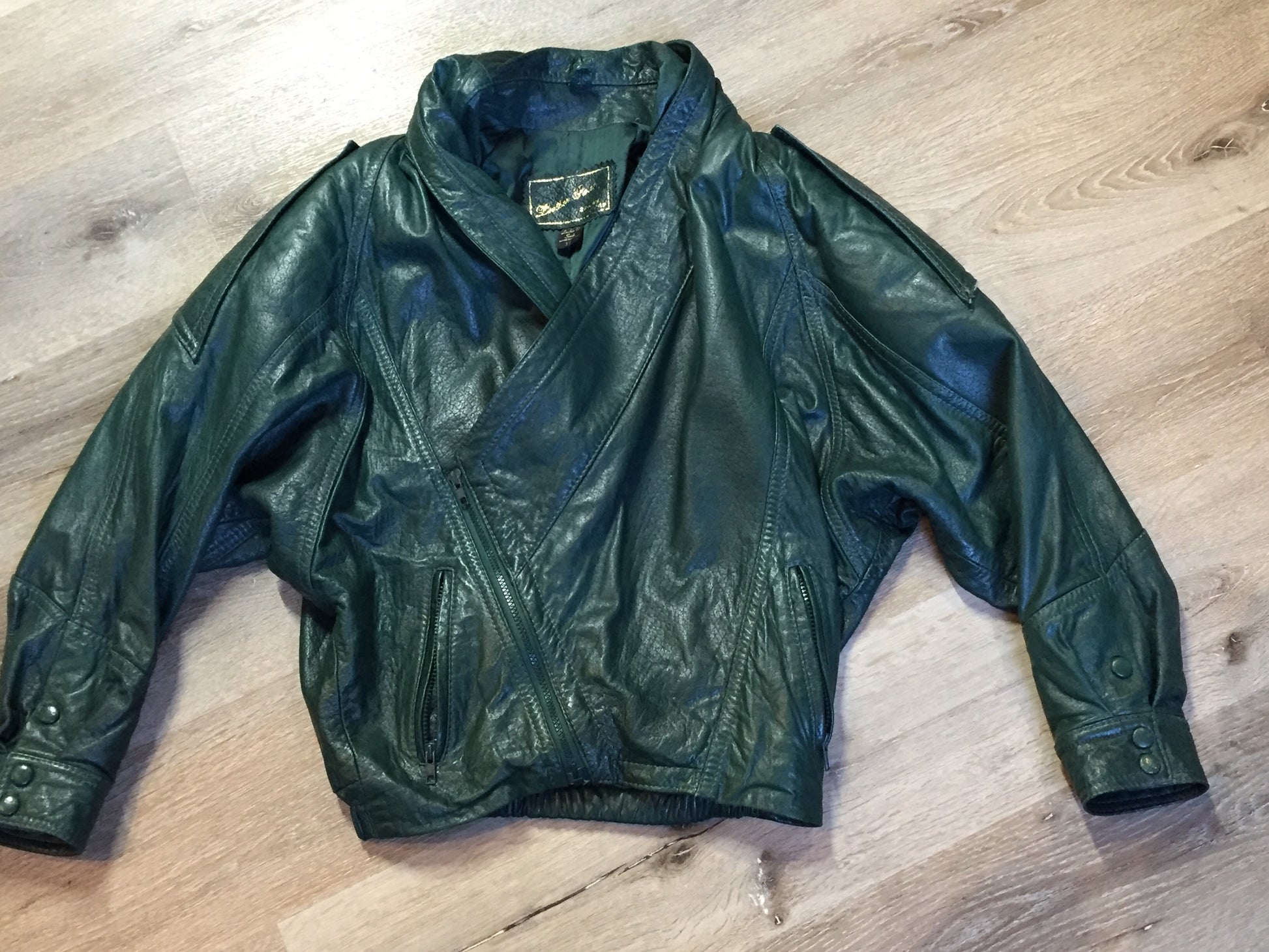 Kingspier Vintage - Leather Factory forest green 1980’s leather jacket with unique shall collar, zipper and vertical pockets, Size XS.