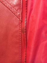 Load image into Gallery viewer, Kingspier Vintage - Zaggara Designs red leather jacket with hidden zipper, slash pockets, inside pocket and a belt at the waist. Size small.
