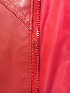 Kingspier Vintage - Zaggara Designs red leather jacket with hidden zipper, slash pockets, inside pocket and a belt at the waist. Size small.
