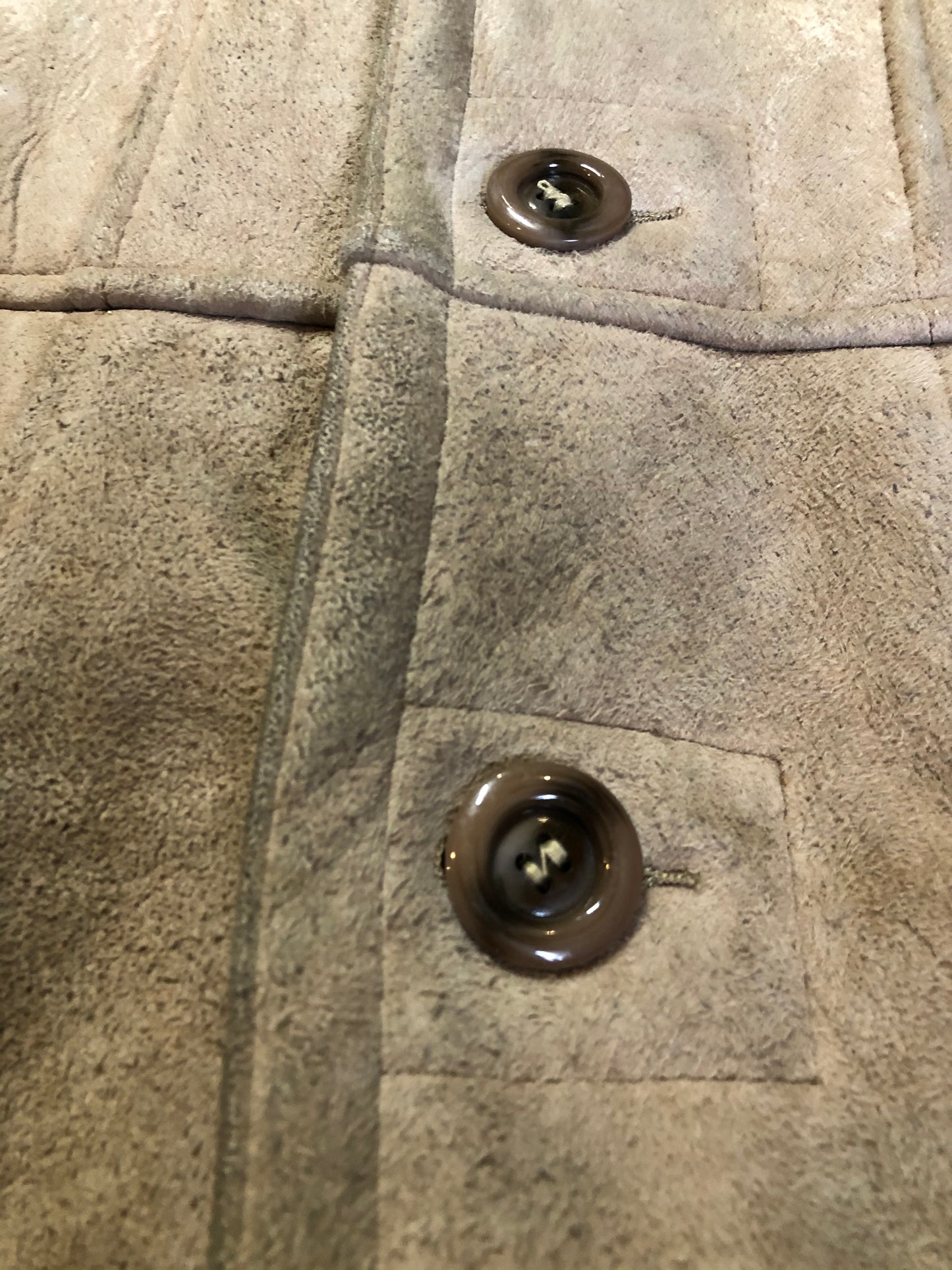 Kingspier Vintage - Leather Attic light brown suede coat with shearling lining, button closures and vertical pockets. Made in Canada. Size 38.