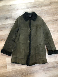 Hilary Radley green shearling coat with button closures and patch pockets. Made in Canada.