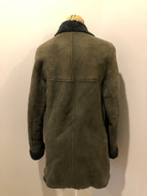 Load image into Gallery viewer, Hilary Radley green shearling coat with button closures and patch pockets. Made in Canada.
