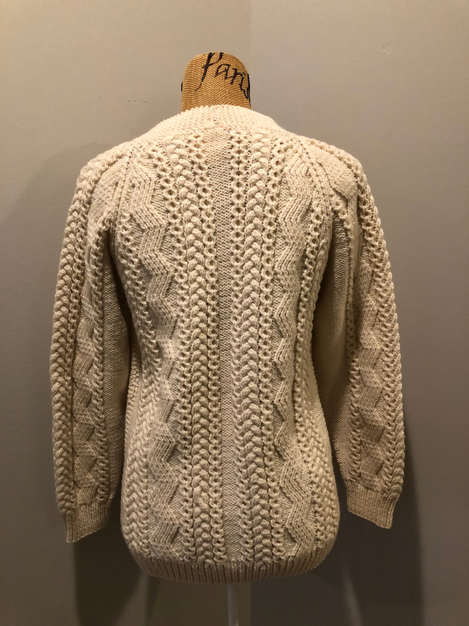 Kingspier Vintage - Vintage hand knit cardigan in cream with button closures. Made in Canada. Size Medium.