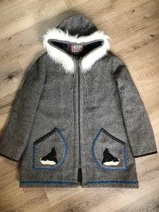 Kingspier Vintage - James Bay pure virgin wool northern parka in grey. This parka features a hood with white faux fur trim, zipper closure, quilted lining, knit inside hidden cuffs, hand stitched detail around the patch pockets and hem, felt seal appliqués in the front and a lovely arctic landscape on the back. Made in Canada.