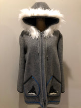 Load image into Gallery viewer, Kingspier Vintage - James Bay pure virgin wool northern parka in grey. This parka features a hood with white faux fur trim, zipper closure, quilted lining, knit inside hidden cuffs, hand stitched detail around the patch pockets and hem, felt seal appliqués in the front and a lovely arctic landscape on the back. Made in Canada.
