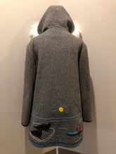 Load image into Gallery viewer, Kingspier Vintage - James Bay pure virgin wool northern parka in grey. This parka features a hood with white faux fur trim, zipper closure, quilted lining, knit inside hidden cuffs, hand stitched detail around the patch pockets and hem, felt seal appliqués in the front and a lovely arctic landscape on the back. Made in Canada.
