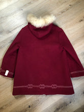 Load image into Gallery viewer, Kingspier Vintage - Sears pure virgin wool northern style parka in raspberry red. This parka features a hood with white faux fur trim, zipper closure, quilted lining, vertical pockets, hidden elastic in the lining at the wrist to keep out cold air, felt deer design appliqués on the front. Made in Canada.

