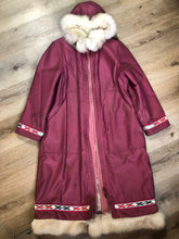 Load image into Gallery viewer, Kingspier Vintage - “Styles North” pink northern parka with removable outer shell featuring a hood with white fur trim, zipper closure, lining, patch pockets, felt warrior appliqué design on the front and back. Made in Canada. 
