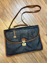 Load image into Gallery viewer, Dooney and Burke all weather leather briefcase in navy with top handle, shoulder strap and brass hardware.
