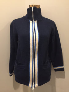 Kingspier Vintage - Vintage wool zip up cardigan in blue with white stripe trim, zipper closure and pockets. Made in Alberta. Size large.