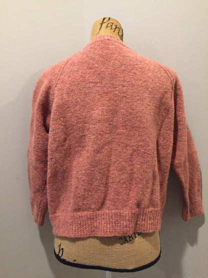 Kingspier Vintage - Hand Knit 100% wool cardigan in pink with cable knit stitch panel running down the center front. Size XS/S.