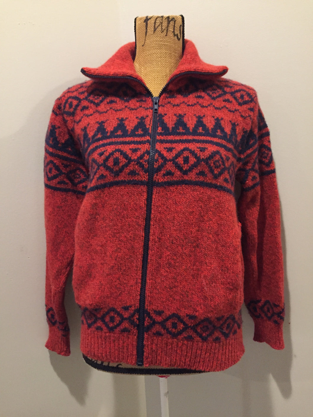 Kingspier Vintage - LL Bean cardigan in rust with navy blue design, zipper closure and vertical pockets. Made in the USA. Size medium (women).
