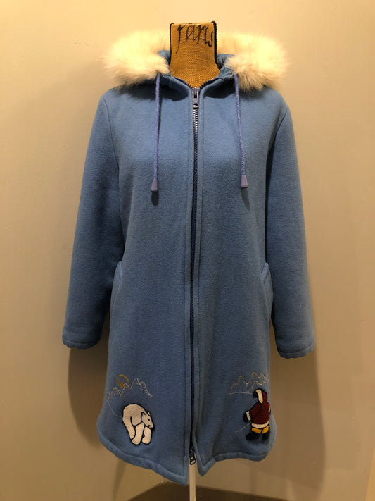 Kingspier Vintage - Northern Sun light blue pure virgin wool northern parka featuring a hood with white fur trim, zipper closure, quilted lining, slash pockets, hidden knit cuffs and arctic life design felt appliqué on the front and back. Made in Canada.