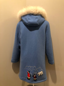 Kingspier Vintage - Northern Sun light blue pure virgin wool northern parka featuring a hood with white fur trim, zipper closure, quilted lining, slash pockets, hidden knit cuffs and arctic life design felt appliqué on the front and back. Made in Canada.
