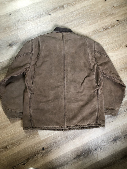 Kingspier Vintage - Carhartt brown chore jacket with brown corduroy collar, button closures, four patch pockets and a felted wool inside lining. Size XL