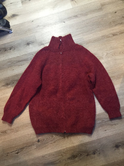 Kingspier Vintage - Raspberry red cardigan with zipper closure. Fibres are unknown. Size large.