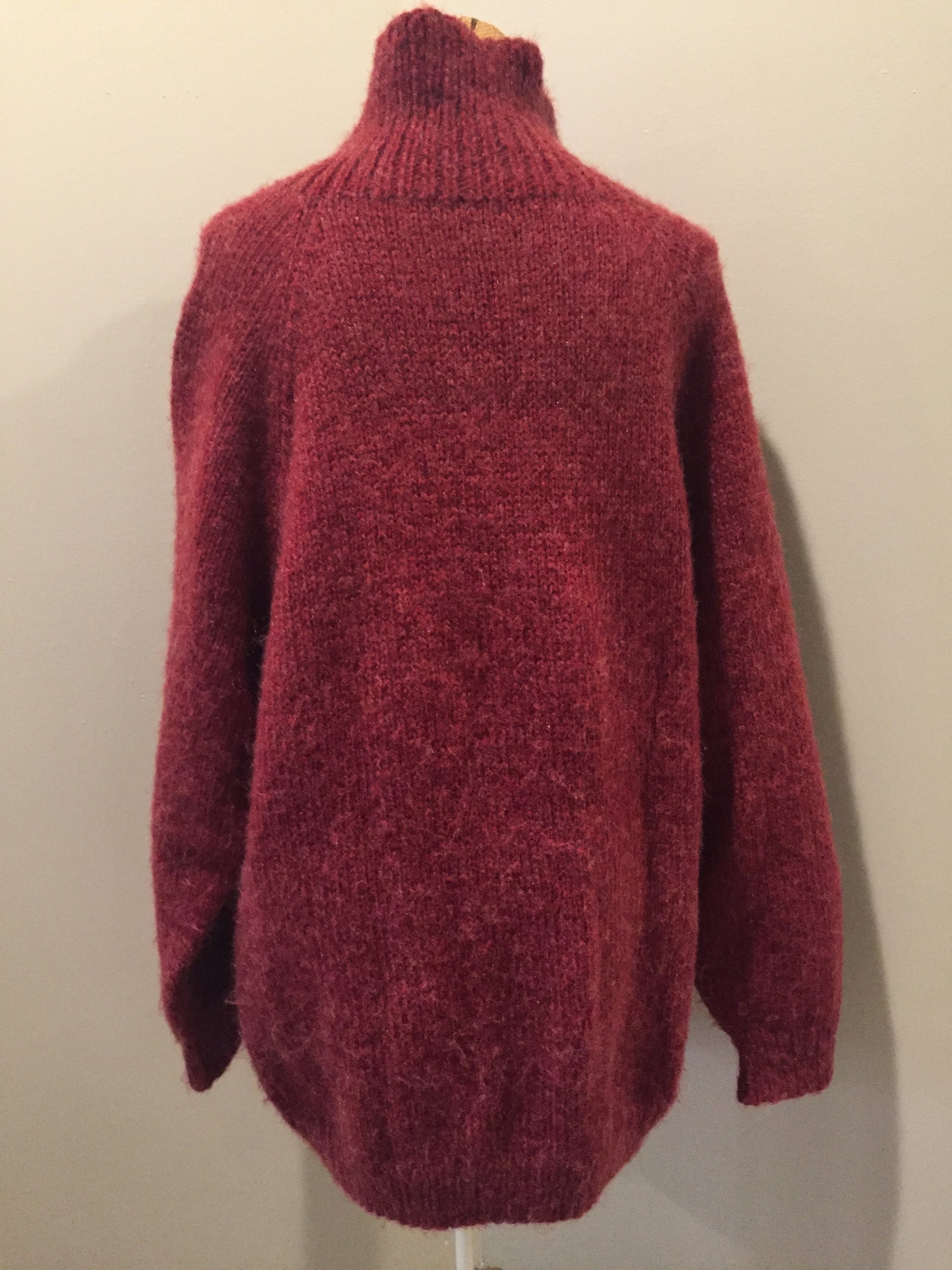 Kingspier Vintage - Raspberry red cardigan with zipper closure. Fibres are unknown. Size large.