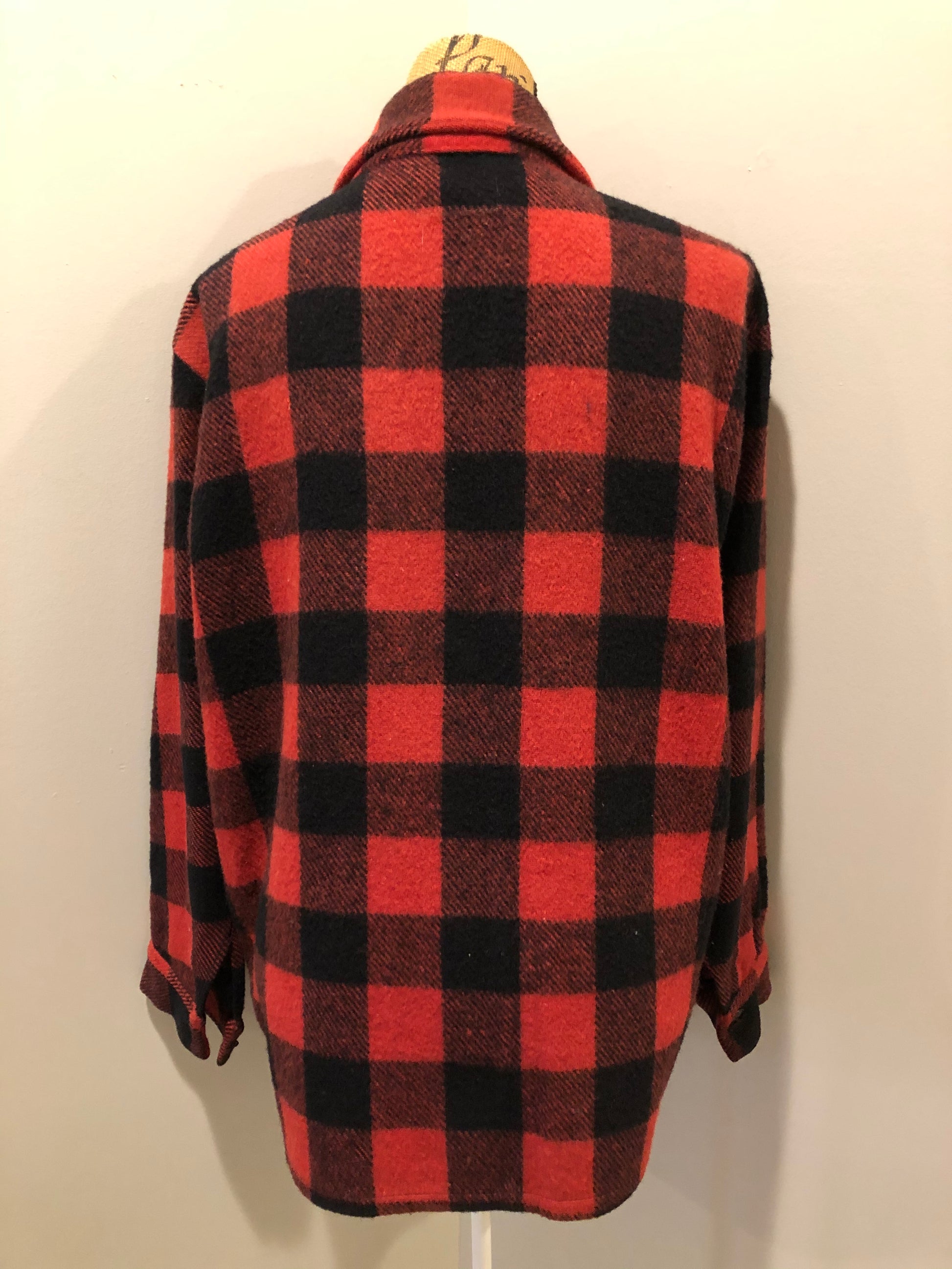 Kingspier Vintage - Sigal red wool blend lumberjack shirt with button closures, two flap pockets, two slash pockets. Made in Canada. Size large.