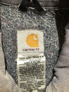 Kingspier Vintage - Carhartt blue canvas chore jacket with beige corduroy collar. The jacket is distressed with frayed edges, wool lining, one zip pocket on the chest and two slash pockets. Made in the USA.
