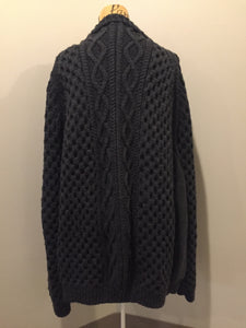 Kingspier Vintage - Hand knit honeycomb and cable stitch cardigan in charcoal grey with button closures. Fibres are unknown. Size XXL (mens).