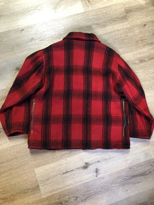 Kingspier Vintage - Johnson Woolen Mills red plaid wool hunting jacket with button closures, inside knit cuffs to keep cold air out, four flap pockets, two hand warming pockets, two side zip pockets and one inside pocket.