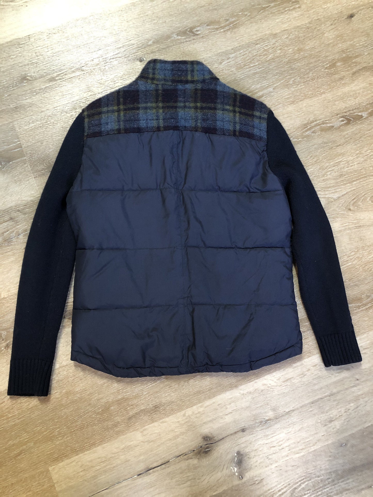 Kingspier Vintage - Fairwhale navy blue down filled jacket with knit sleeves, cozy Sherpa style collar, zipper and snap closures, patch pockets and one inside pocket. Size medium.