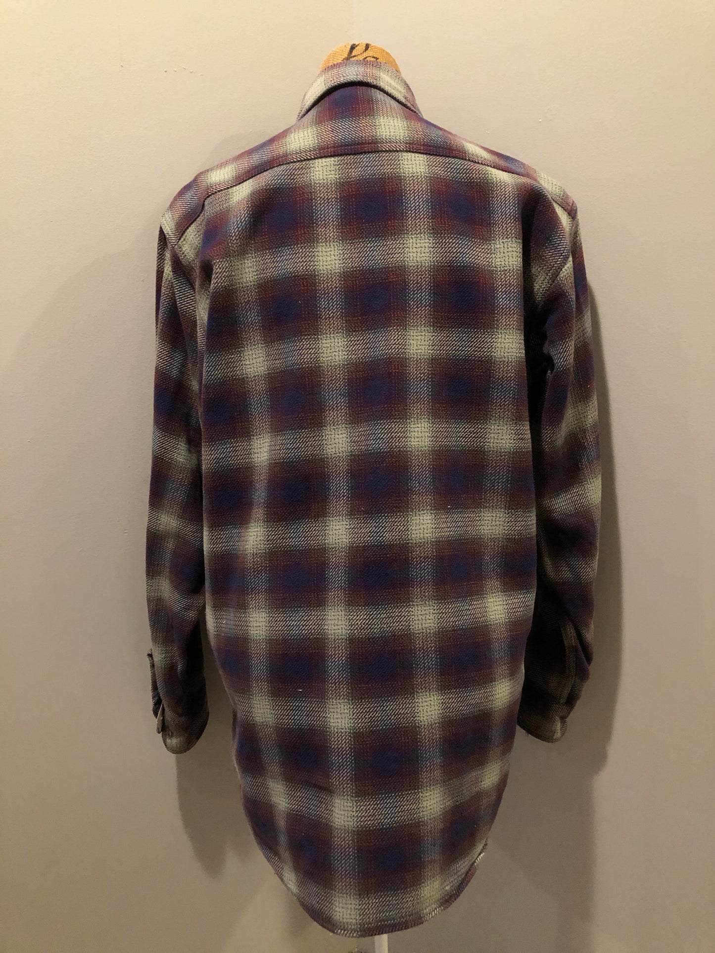 Kingspier Vintage - Herman Survivor faded blue red and green plaid lumberjack shirt with button closures and two flap pockets on the chest. Size large.