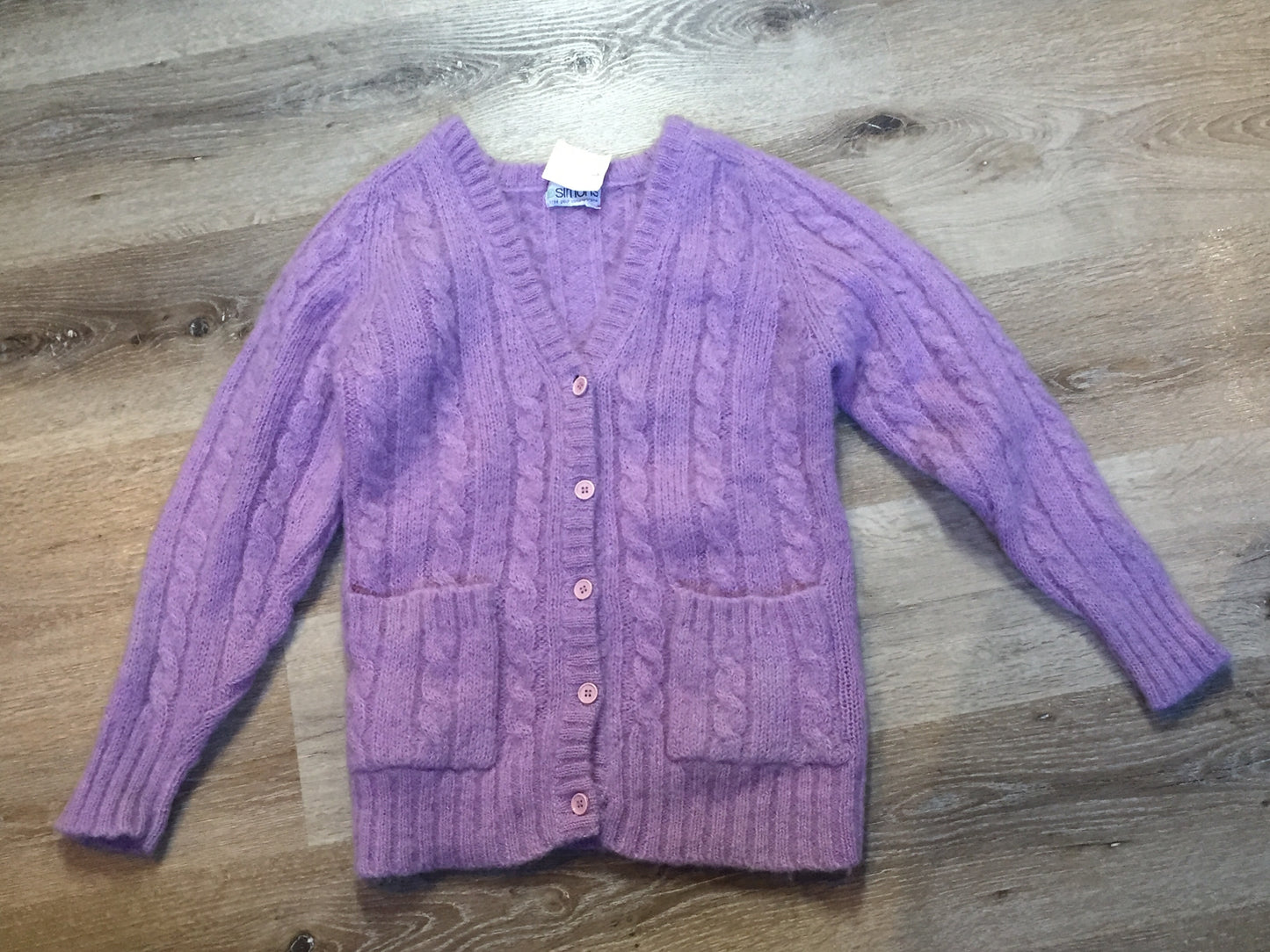 Kingspier Vintage - La Maison Simon’s cable knit wool and mohair blend cardigan in lavender with button closures and patch pockets. Size medium.