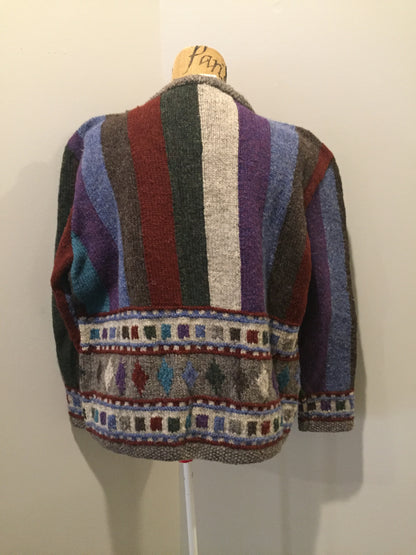 Kingspier Vintage - Hand knit cardigan with grey/green/red/purple/blue design and button closures. Size medium.