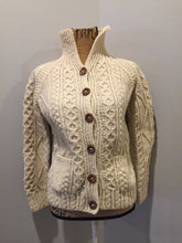 Load image into Gallery viewer, Kingspier Vintage - Fisherman’s style honeycomb, diamond and braided knit wool cardigan in cream with button closures and patch pockets. Size small (womens).
