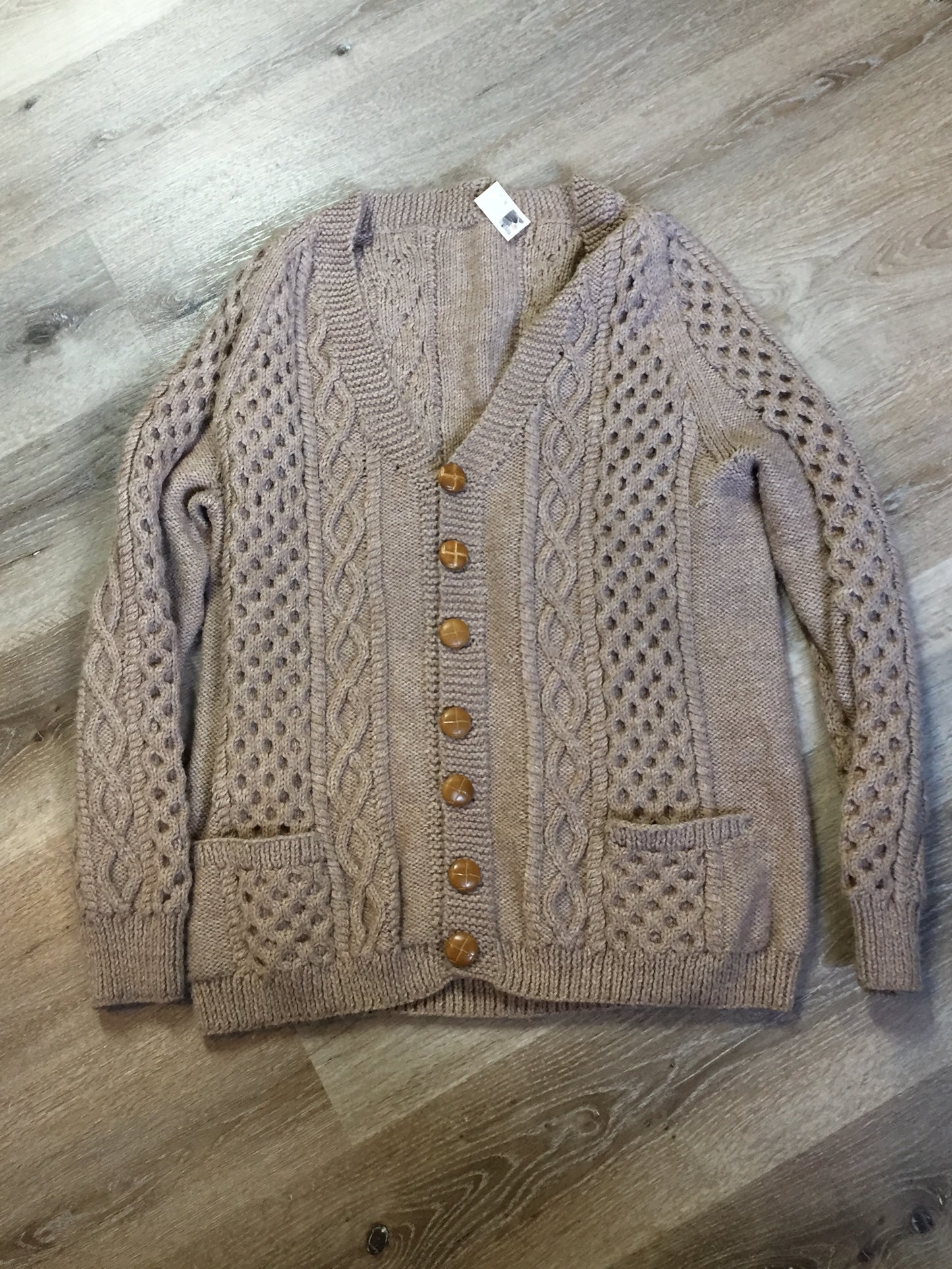 Kingspier Vintage - Hand knit honeycomb and cable stitch wool cardigan in beige with button closures and patch pockets. Size L/XL.