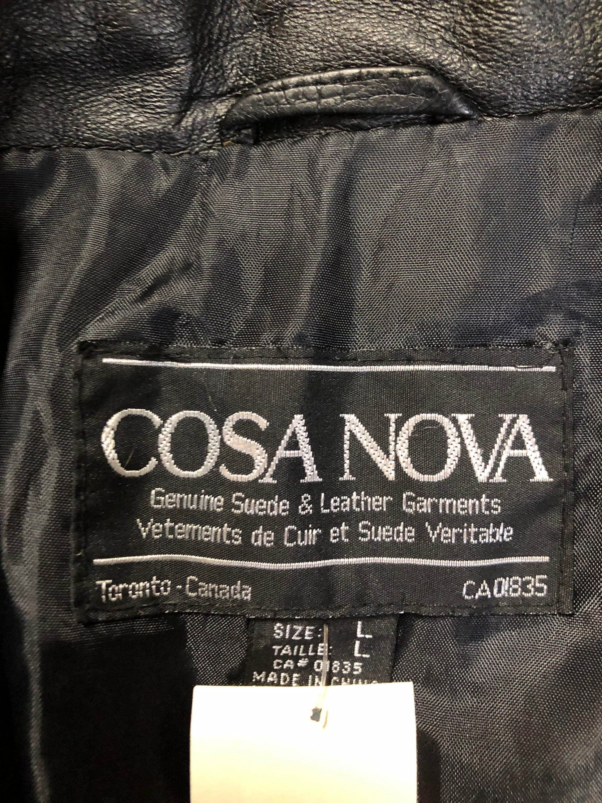 Kingspier Vintage - Cosa Nova black leather motorcycle jacket with two slash pockets, one flap pocket and a belt at the waist. Made in Canada. Size large.