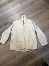 Load image into Gallery viewer, Kingspier Vintage - Mary Maxim wool cardigan in cream with ram design on the back, zipper closure and one pocket in the front. Made in Nova Scotia, Canada. Size large.
