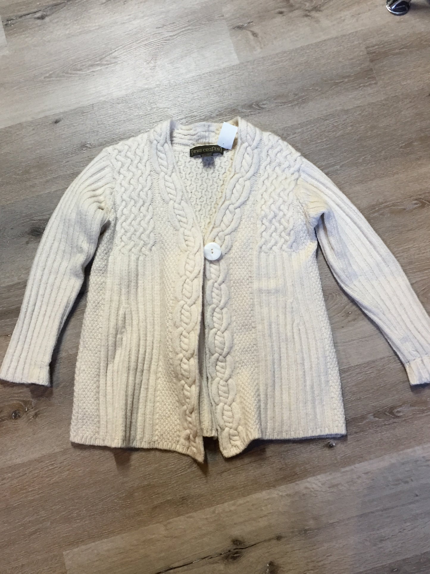 Kingspier Vintage - Vintage Inis Crafts merino wool cardigan in cream with one button closure at the collar. Size large.