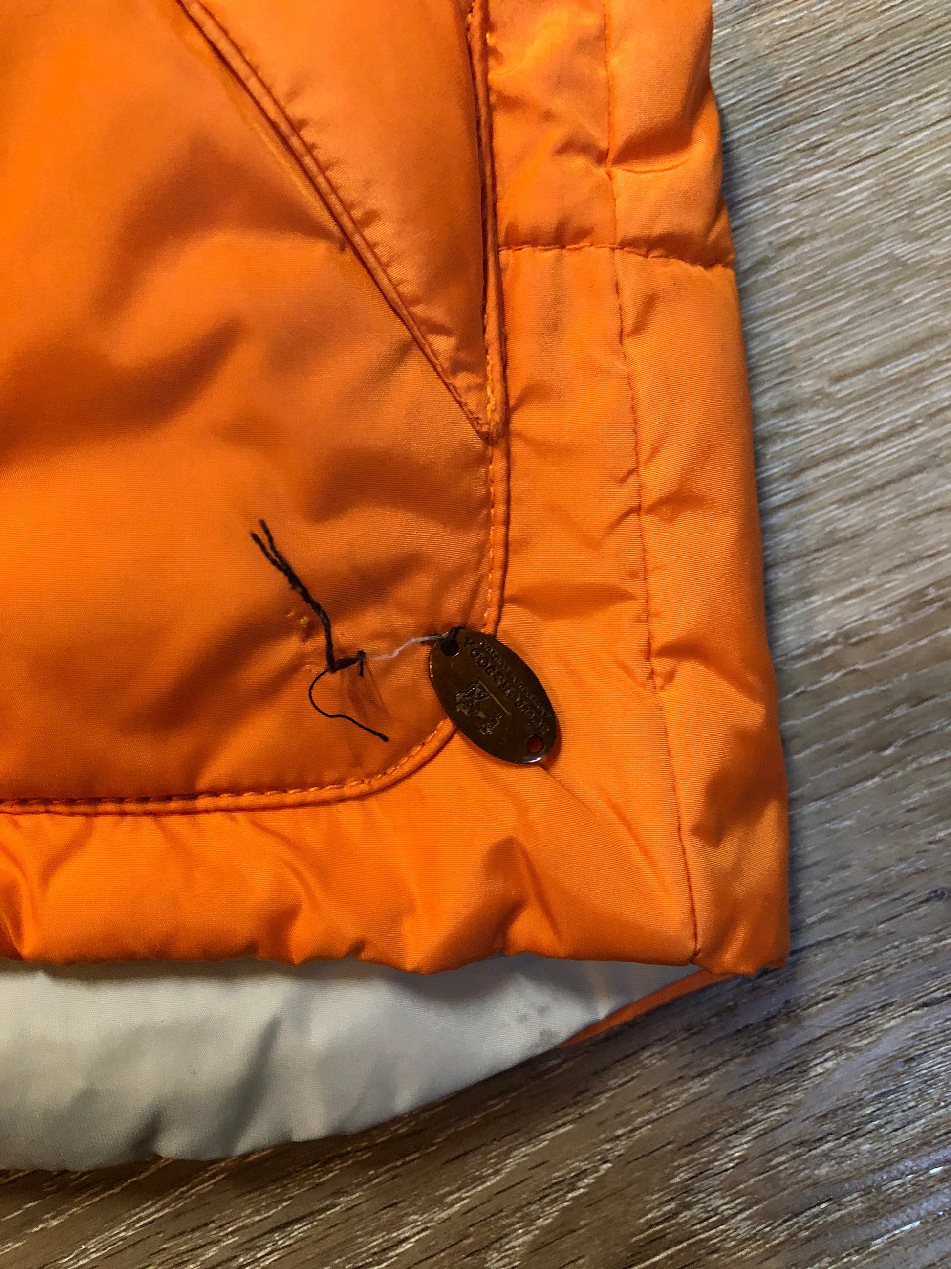 Kingspier Vintage - Scotch and Soda reversible orange and grey 1970’s down filled puffer vest with snap closures and patch pockets. Made in Amsterdam.