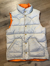 Load image into Gallery viewer, Kingspier Vintage - Scotch and Soda reversible orange and grey 1970’s down filled puffer vest with snap closures and patch pockets. Made in Amsterdam.Scotch and Soda reversible orange and grey 1970’s down filled puffer vest with snap closures and patch pockets. Made in Amsterdam.

