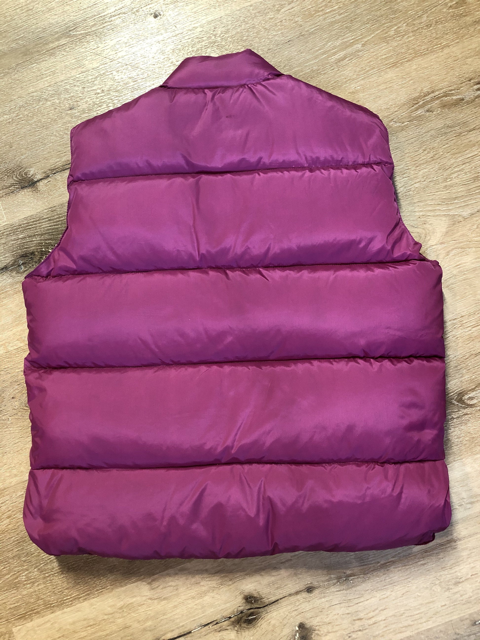 Kingspier Vintage - L.L.Bean dark pink down filled puffer vest with snap closures, slash pockets and is longer in the back. Size medium.