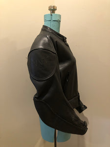 Kingspier Vintage - Vintage MW Leathers black full grain leather motorcycle jacket with mesh lining,snap collar, zipper closure, zip pockets and am inside pocket.