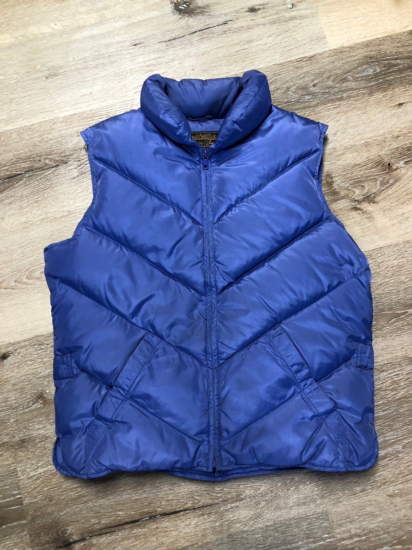 Kingspier Vintage - Eddie Bauer purple down filled puffer vest with zipper closure and slash pockets. Size medium.