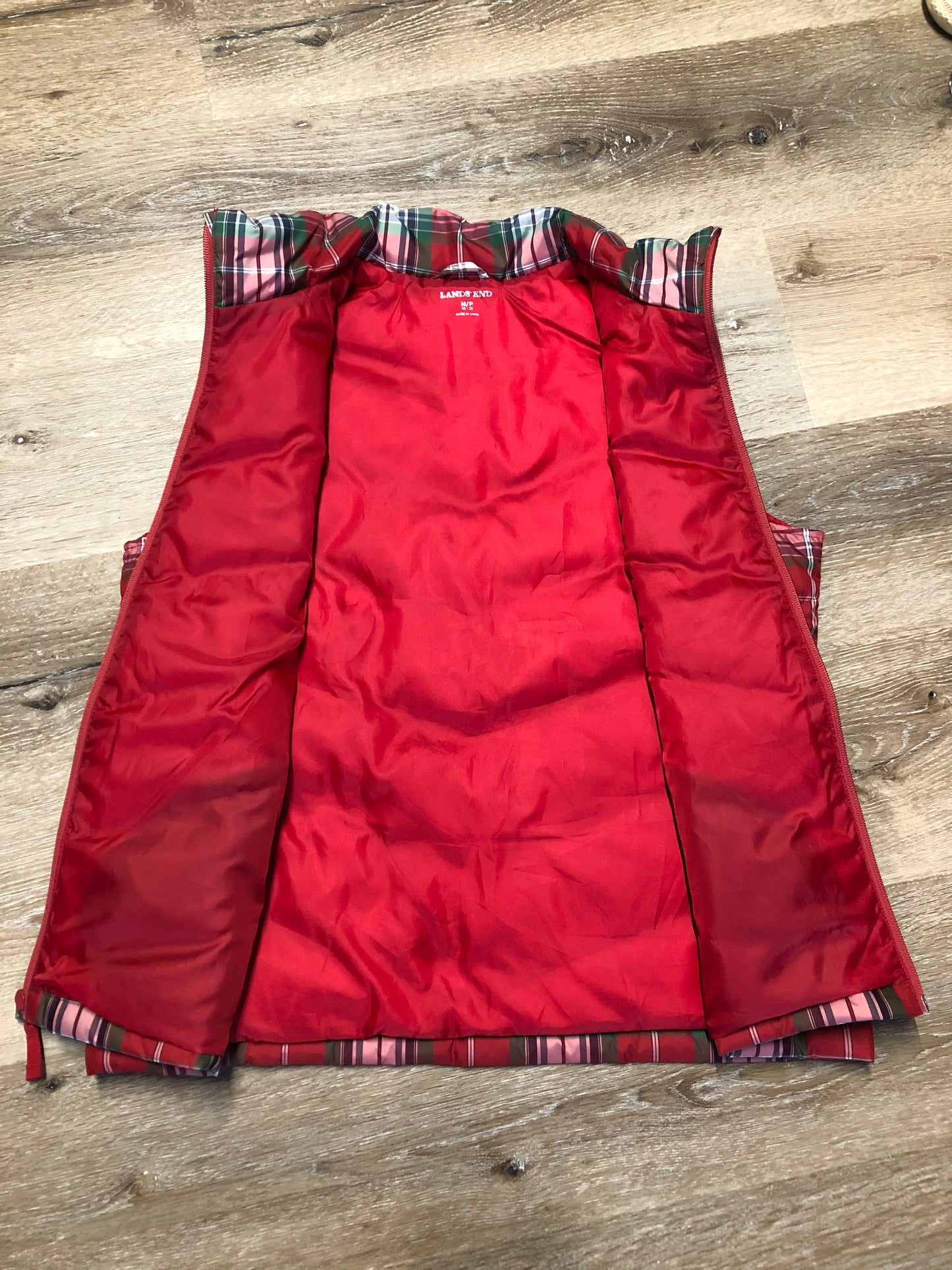 Kingspier Vintage - Land’s End red/ green/ blue/ white plaid down filled vest with zipper closure and slash pockets. Size medium.