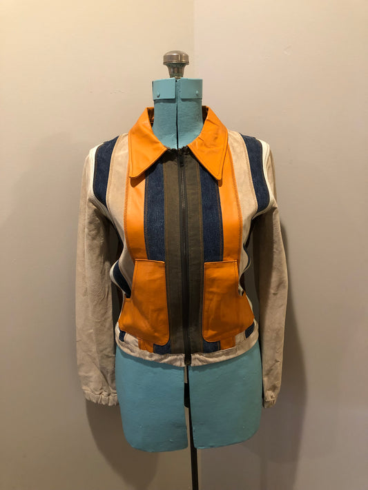 Kingspier Vintage - Very rare vintage 1970’s Gipsy Mauritius leather, suede and cotton patchwork jacket with zipper closure and patch pockets. Size small.