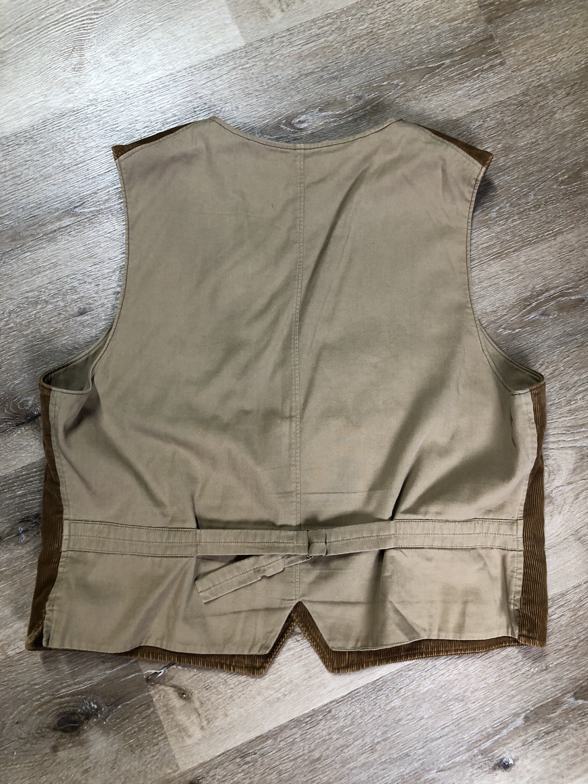 Kingspier Vintage - Ralph Lauren brown corduroy vest with button closures, four patch pockets and two inside pockets.