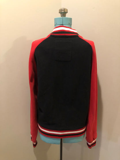 Kingspier Vintage - Vintage 1980’s Rolling Paper Co. varsity style jacket with snap closures and slash pockets. Cotton/ polyester blend. Size medium.