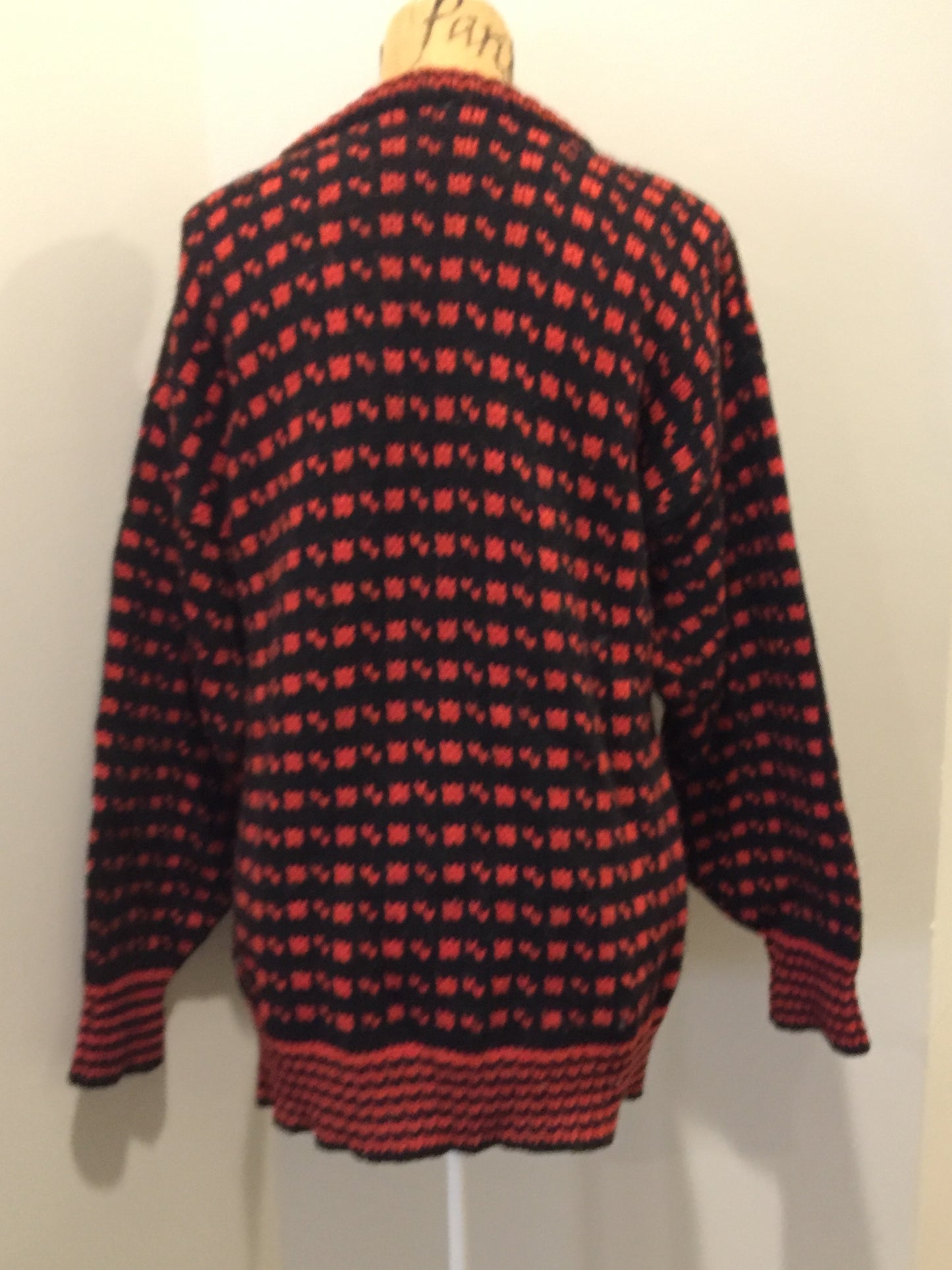 Kingspier Vintage - Hand knit black and red heritage print wool sweater. Made in Canada. Size L/XL.