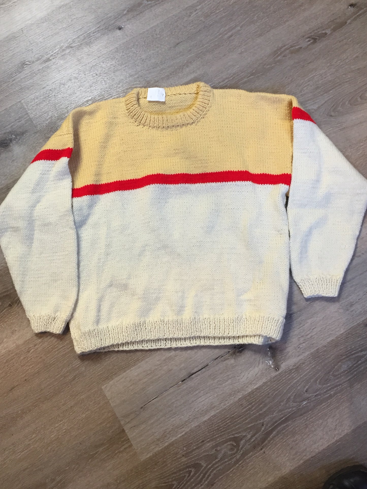 Kingspier Vintage - Hand knit cream, yellow and red sweater. Fibres unknown. Size medium. 