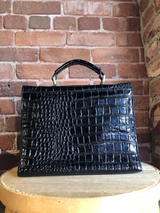 Kingspier Vintage - Remo black shiny reptile handbag with top handle, magnetic front closure, suede lining with inside divider pocket and change pocket.
