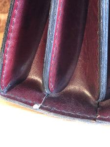 Kingspier Vintage - Caggiano deep red calfskin leather purse with brass hardware, two buckles on each side to allow the top to open fully, inside dividers and pockets. Made in Italy.